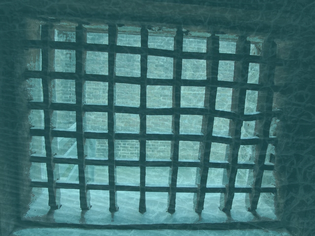 Bars on prison window.