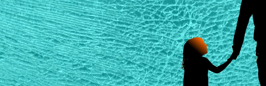 Child looking up to parent - holding hands.