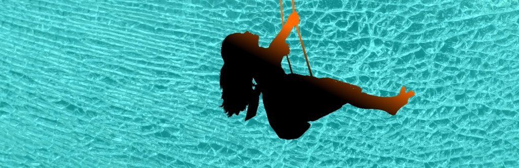 Young girl on swing silhouette