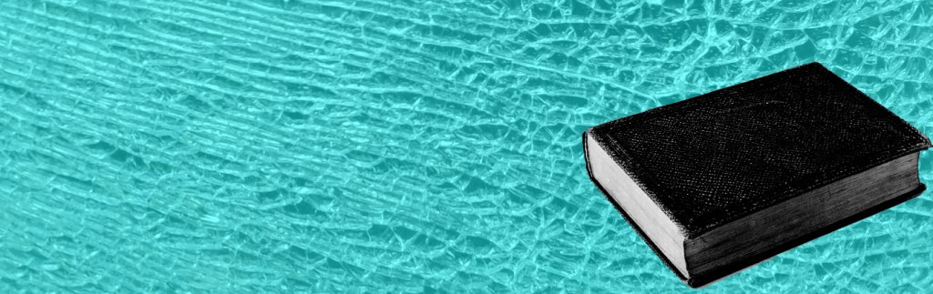 Black and White picture of a Bible on background of broken glass.