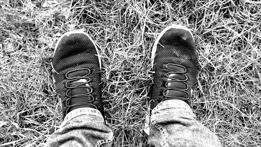 Black and White photo of a pair of trainers.